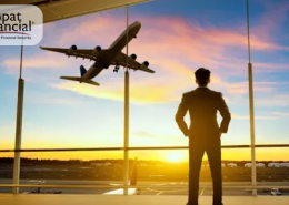 Digital nomad looking at an airplane from an airport terminal, representing international travel, global mobility, and nomad health insurance coverage.